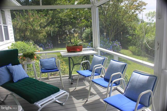 4153 School Road Broomes Island, MD 20615 - Photo 9 of 25 Lower level screened-in porch