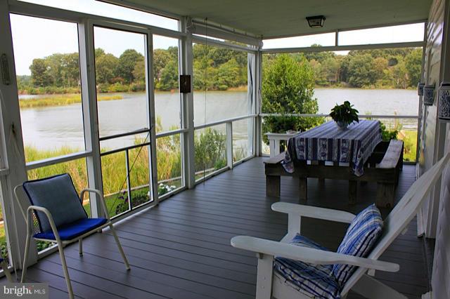4153 School Road Broomes Island, MD 20615 - Photo 10 of 25 Lower level screened-in porch