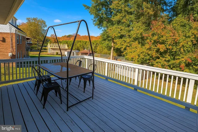 a view of a chairs on the roof deck