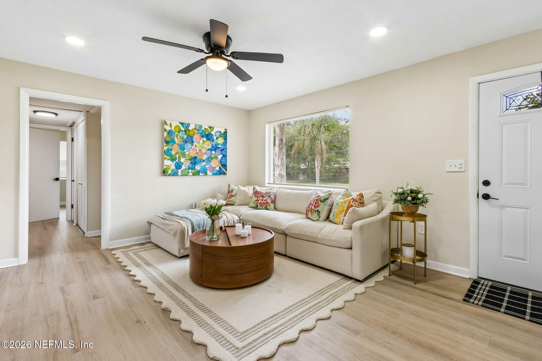 3668 Marianna Road Jacksonville, FL 32217 - Photo 6 of 28 a living room with furniture and a large window