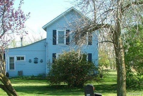 9290 East Madison Road Wheeler, MI 48662 - Photo 1 of 2 7100891956 Front view.jpg