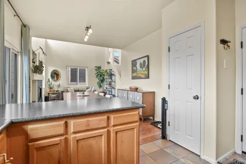 a view of a kitchen from the hallway