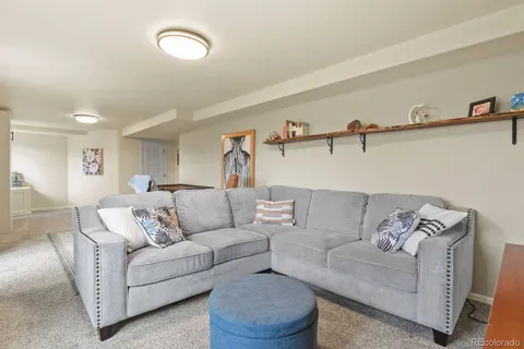 a living room with furniture and a couch
