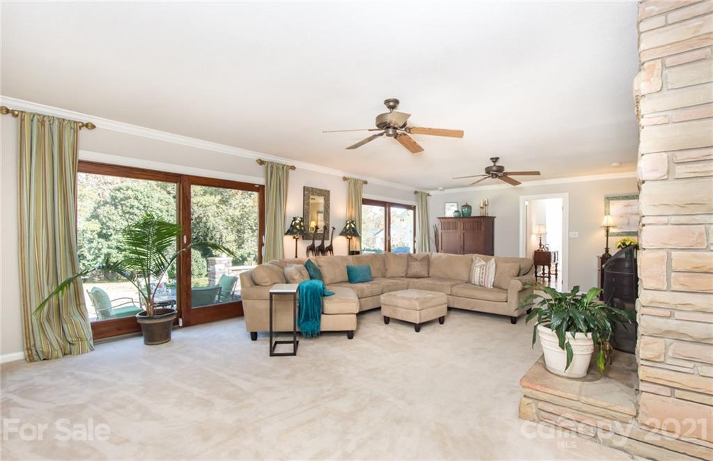 6955 Old Providence Road Charlotte, NC 28226 - Photo 17 of 44 a living room with furniture and windows