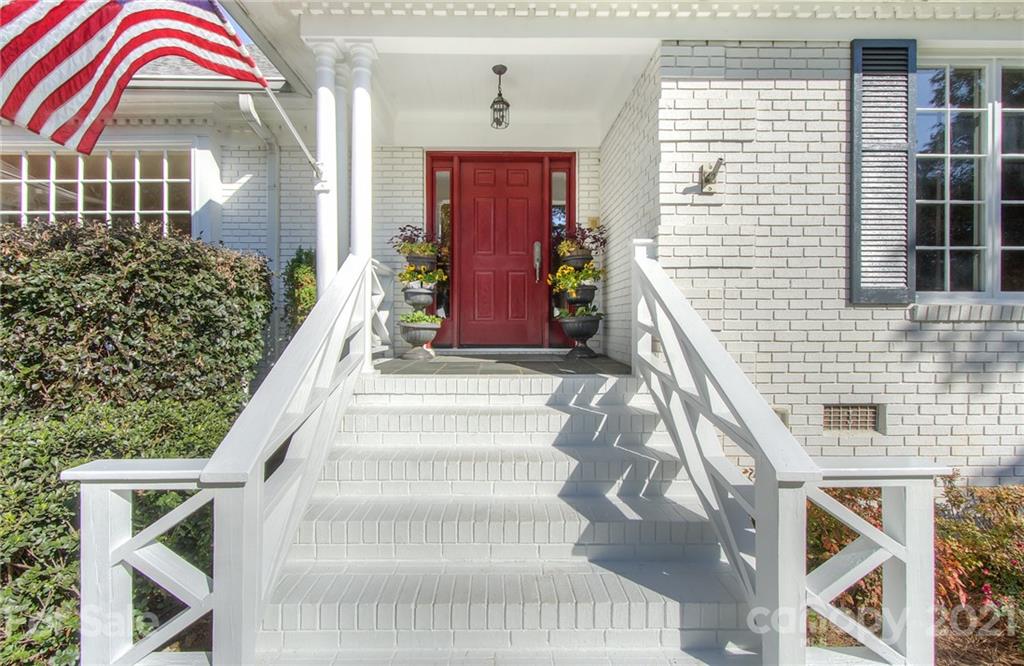 6955 Old Providence Road Charlotte, NC 28226 - Photo 3 of 44 a view of swimming pool with a porch