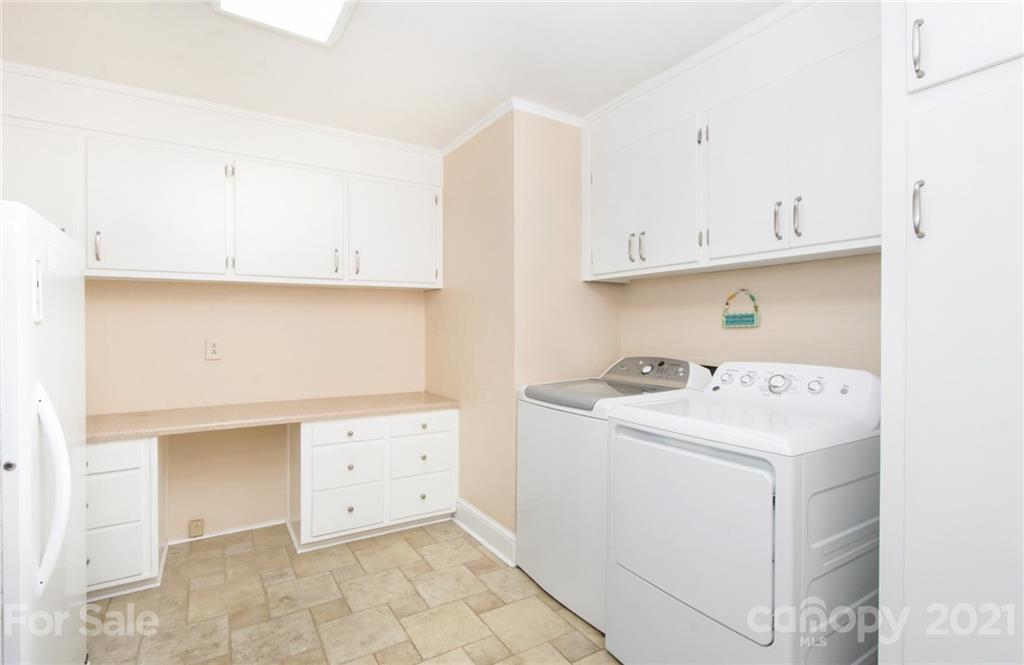 6955 Old Providence Road Charlotte, NC 28226 - Photo 30 of 44 a view of utility room with washer and dryer