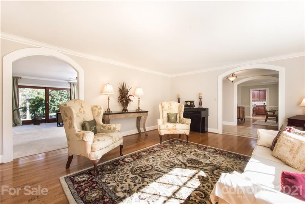 6955 Old Providence Road Charlotte, NC 28226 - Photo 6 of 44 a living room with furniture and a rug