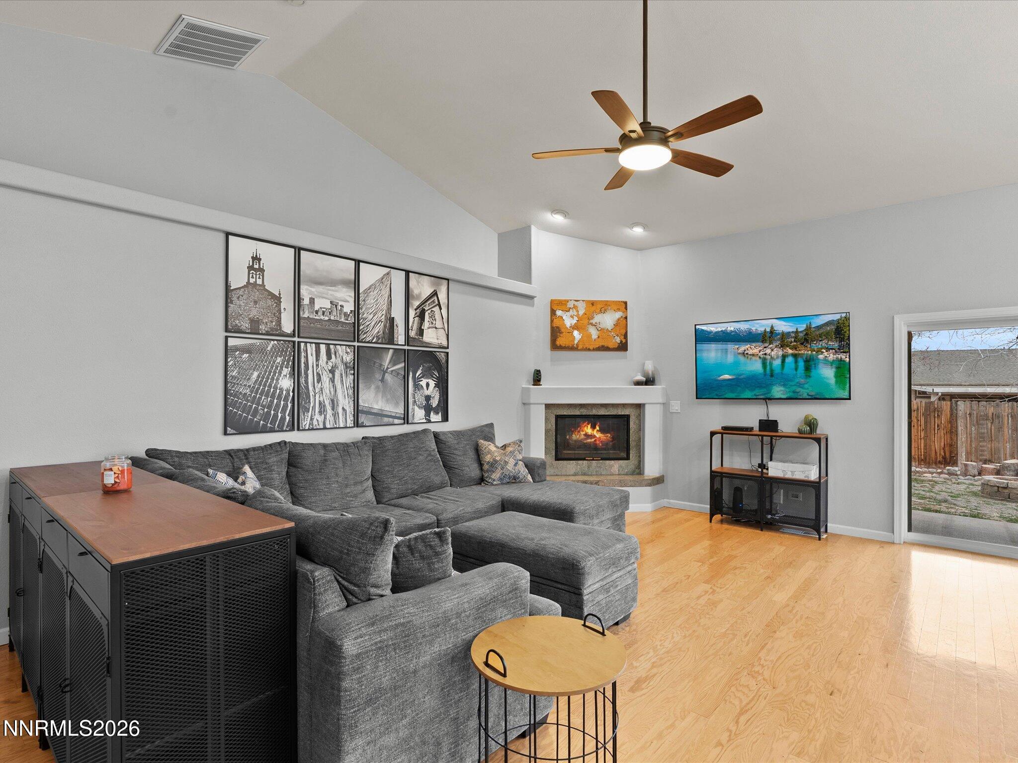 112 Alexander Court Fernley, NV 89408 - Photo 16 of 61 a living room with furniture and a flat screen tv