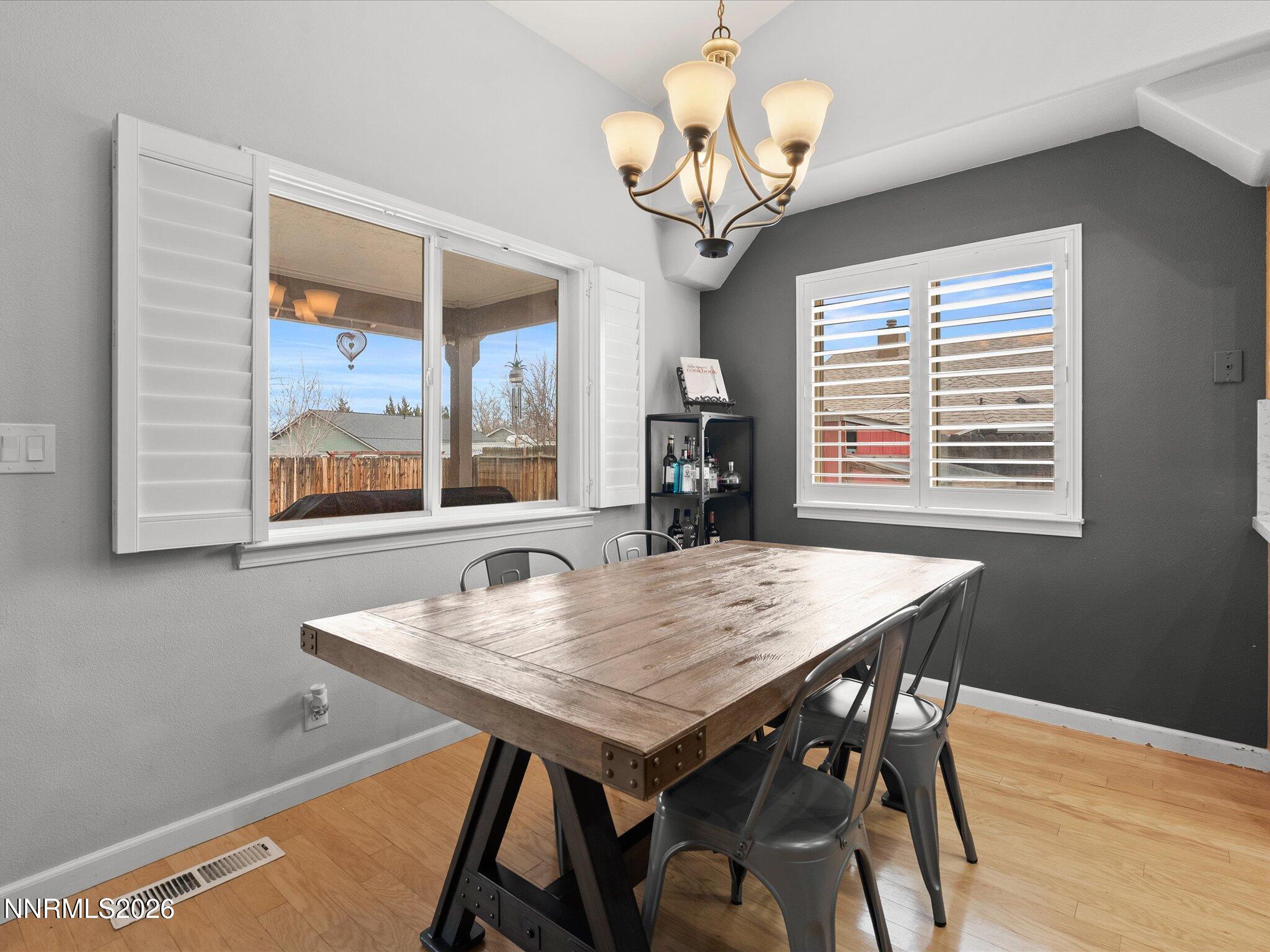 112 Alexander Court Fernley, NV 89408 - Photo 21 of 61 a view of a dining room with furniture window and outside view