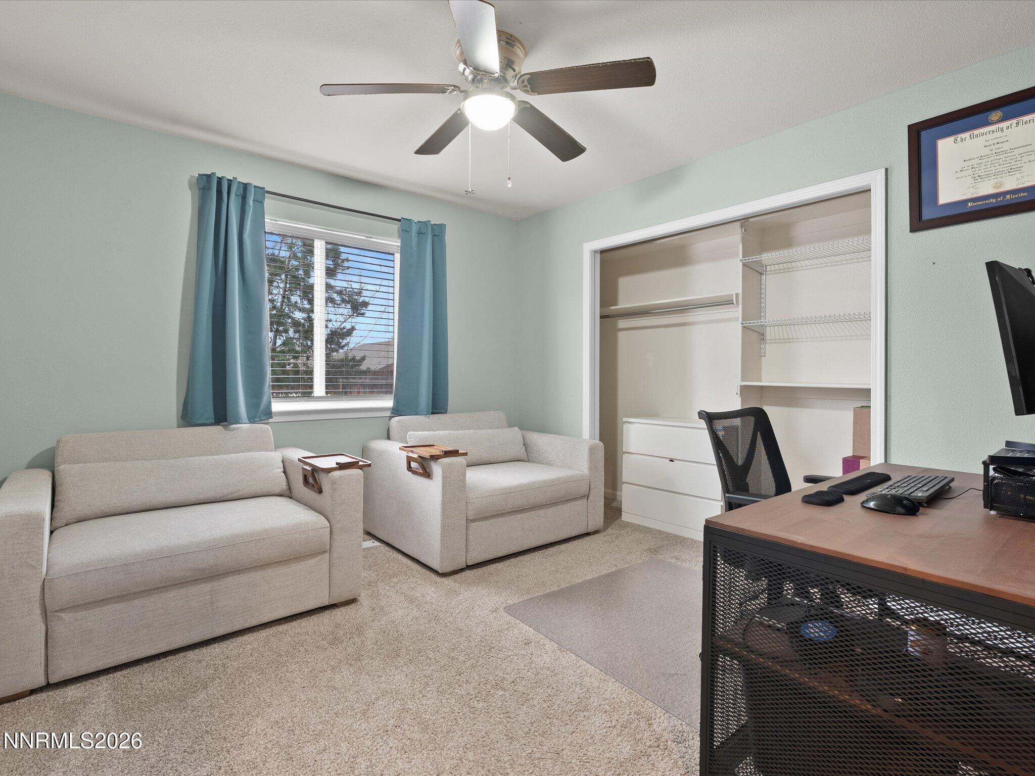 112 Alexander Court Fernley, NV 89408 - Photo 29 of 61 a living room with furniture and a window