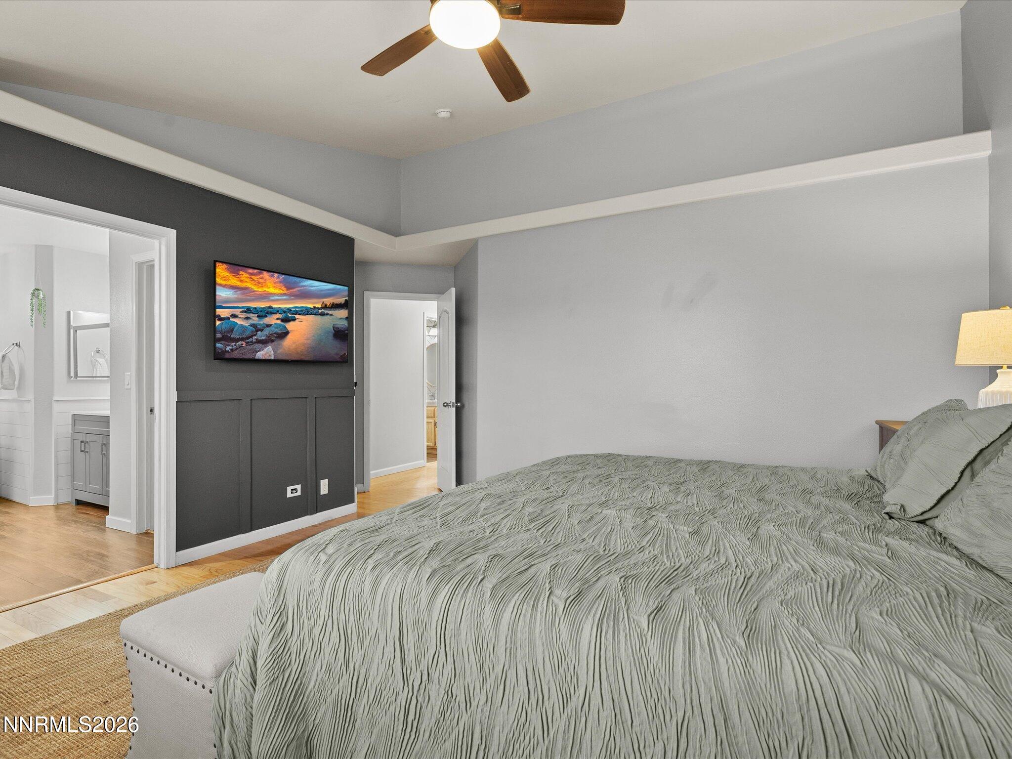 112 Alexander Court Fernley, NV 89408 - Photo 34 of 61 a bedroom with a bed and a television
