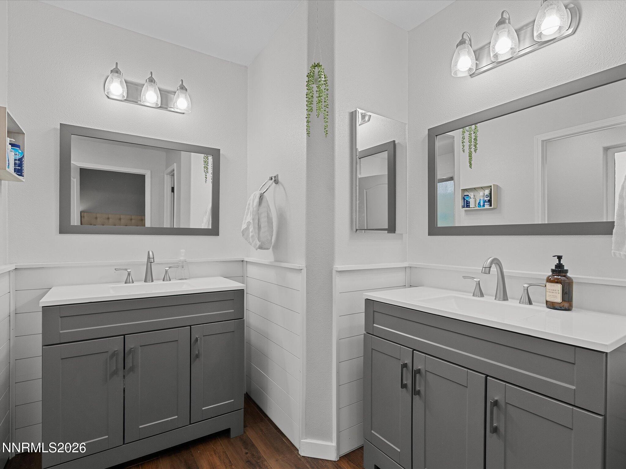 112 Alexander Court Fernley, NV 89408 - Photo 36 of 61 a bathroom with a double vanity sink and a mirror
