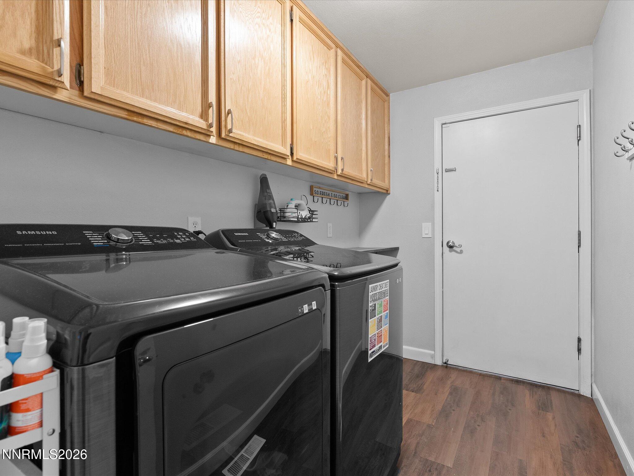 112 Alexander Court Fernley, NV 89408 - Photo 39 of 61 a view of a storage and utility room with wooden floor