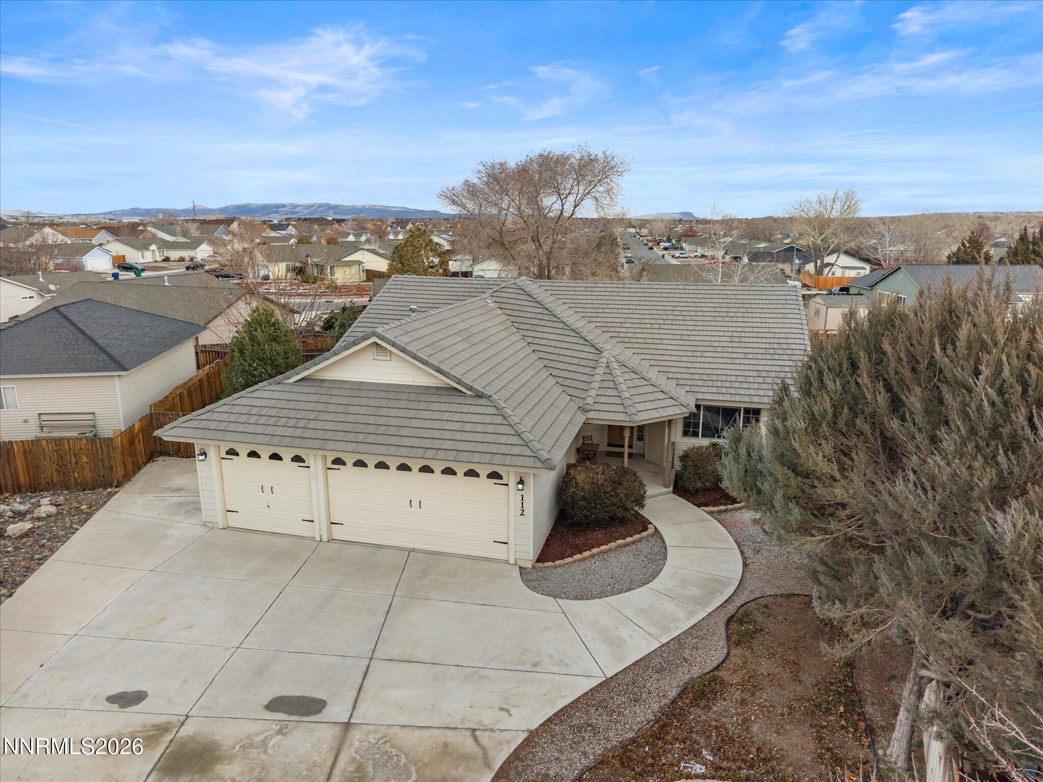 112 Alexander Court Fernley, NV 89408 - Photo 44 of 61 a view of a house with a terrace
