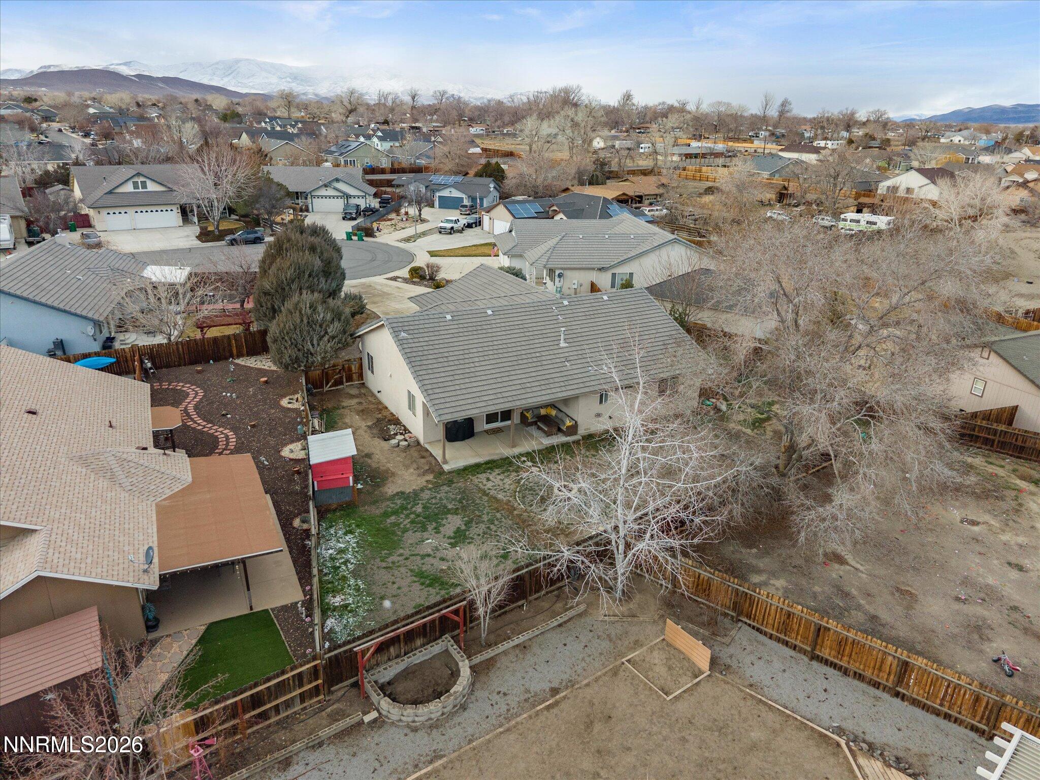 112 Alexander Court Fernley, NV 89408 - Photo 46 of 61 an aerial view of a house with a yard