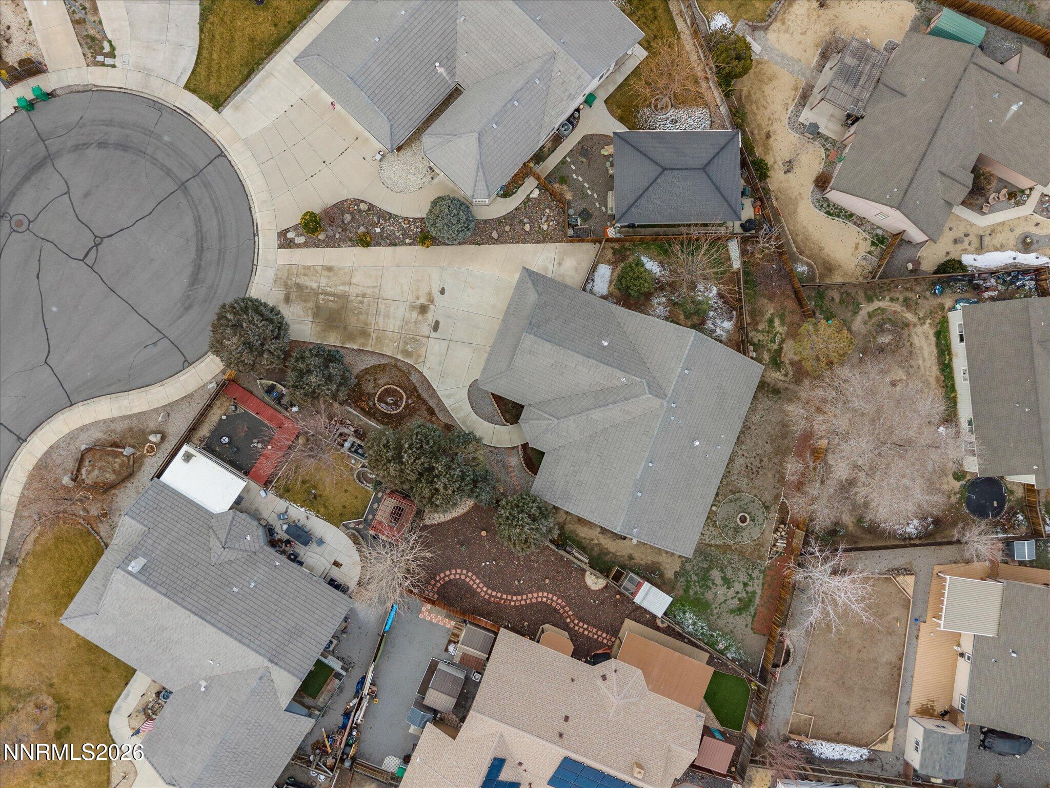 112 Alexander Court Fernley, NV 89408 - Photo 47 of 61 an aerial view of a house with a yard