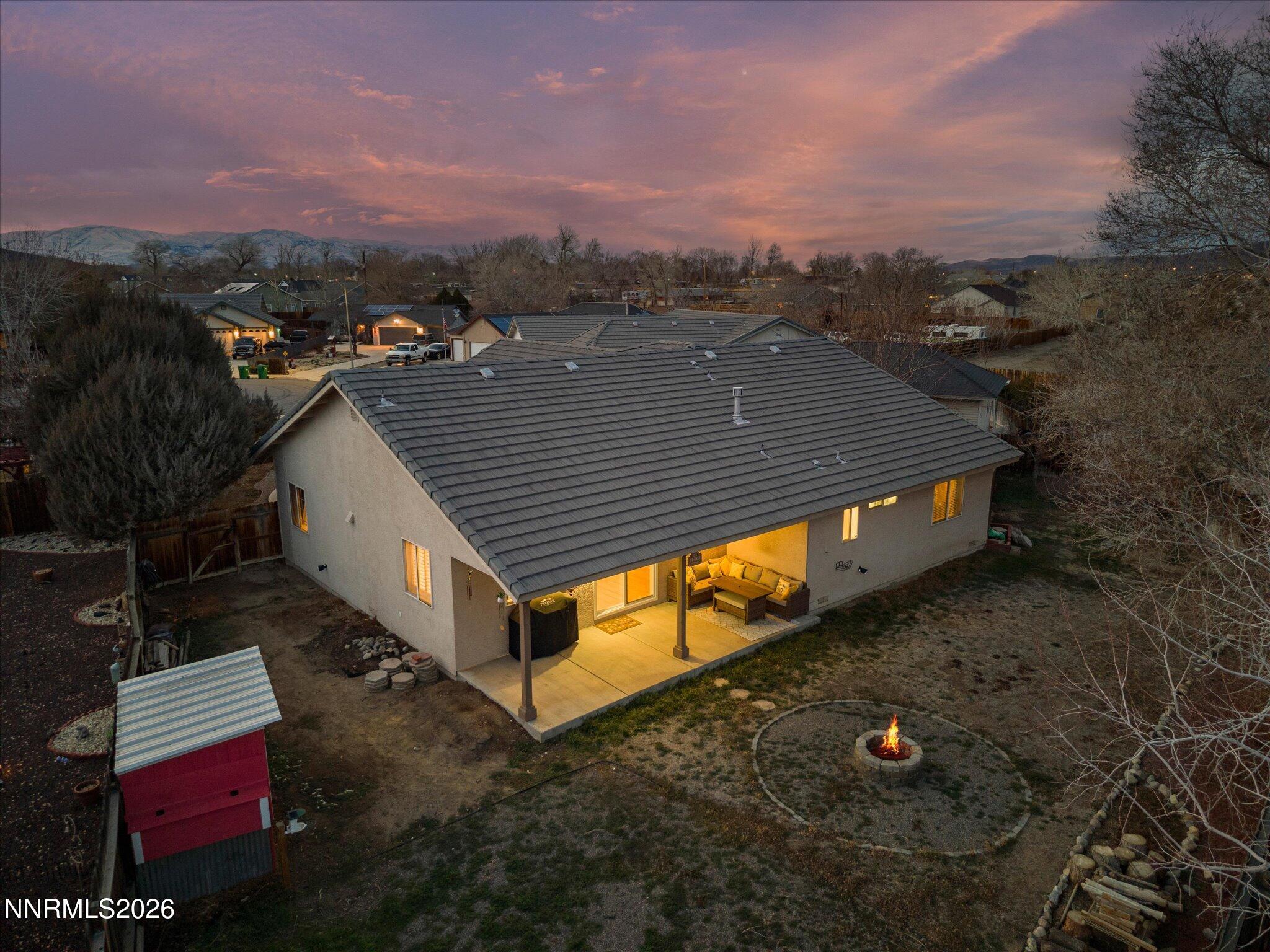 112 Alexander Court Fernley, NV 89408 - Photo 5 of 61 an aerial view of a house with a yard