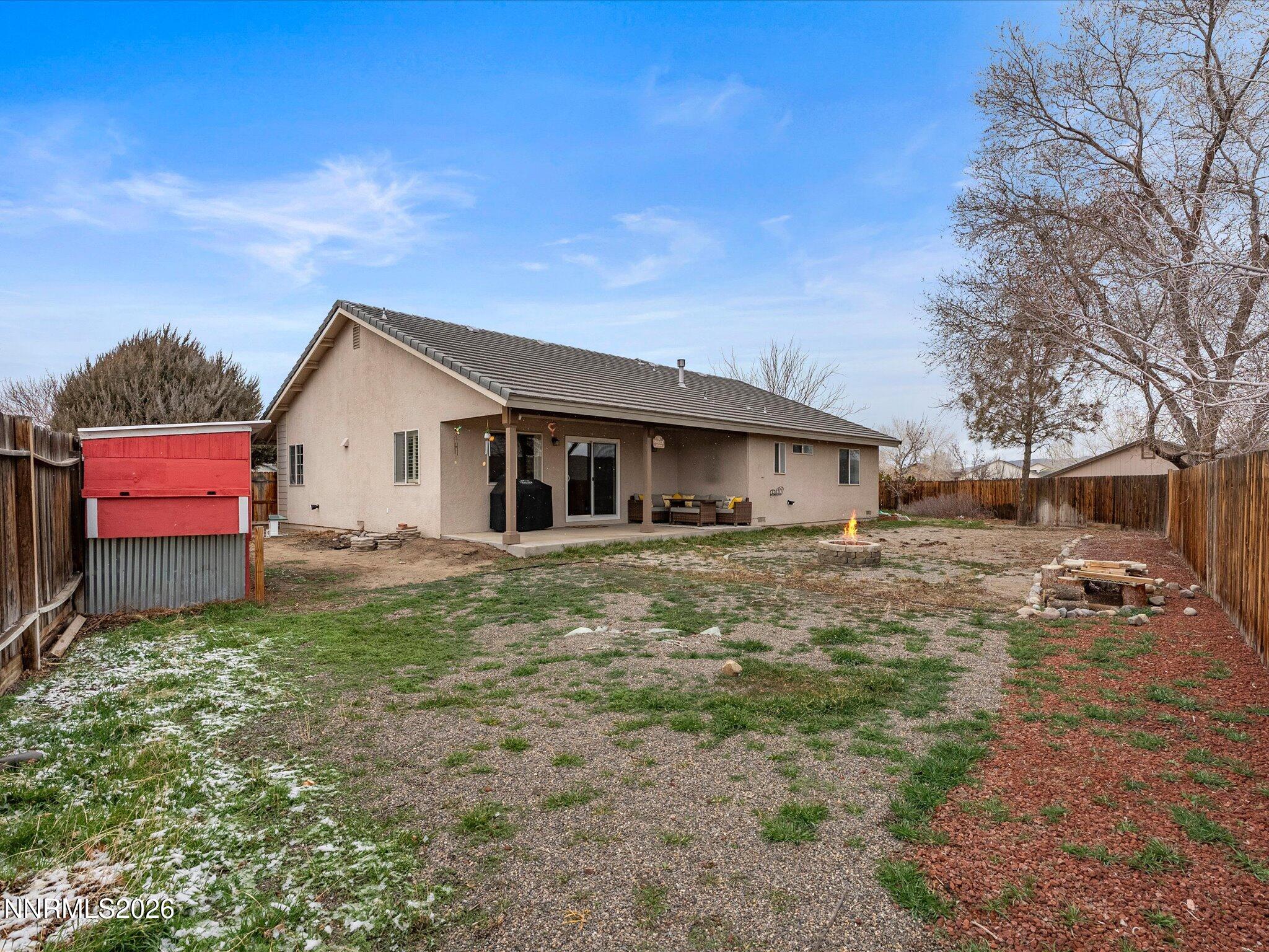 112 Alexander Court Fernley, NV 89408 - Photo 55 of 61 a view of a house with a yard
