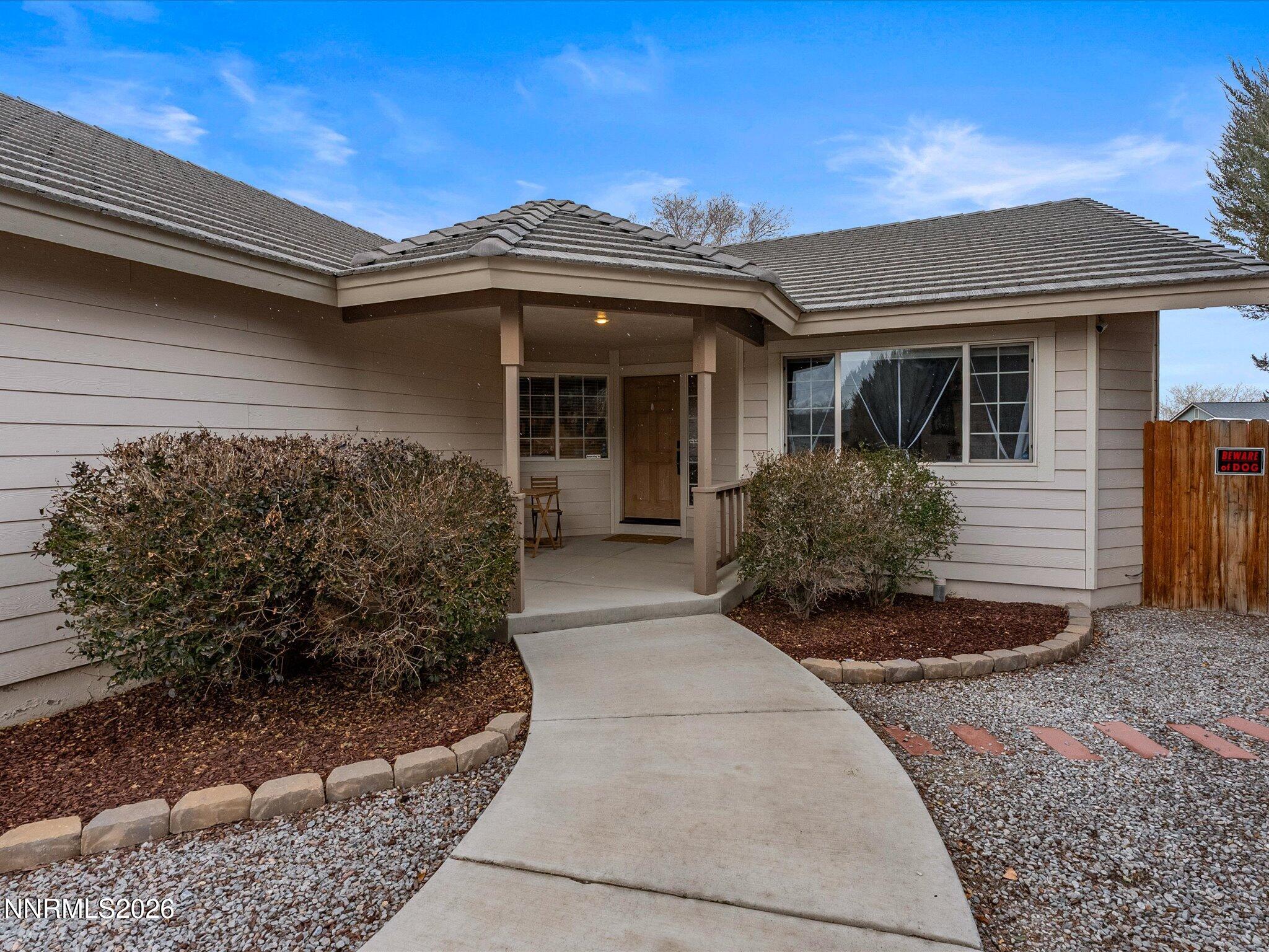112 Alexander Court Fernley, NV 89408 - Photo 8 of 61 a front view of a house