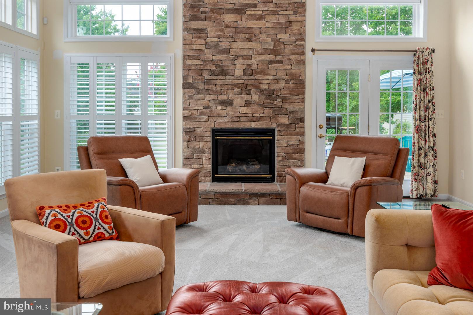250 Concerto Avenue Centreville, MD 21617 - Photo 24 of 34 a living room with furniture window and a fireplace