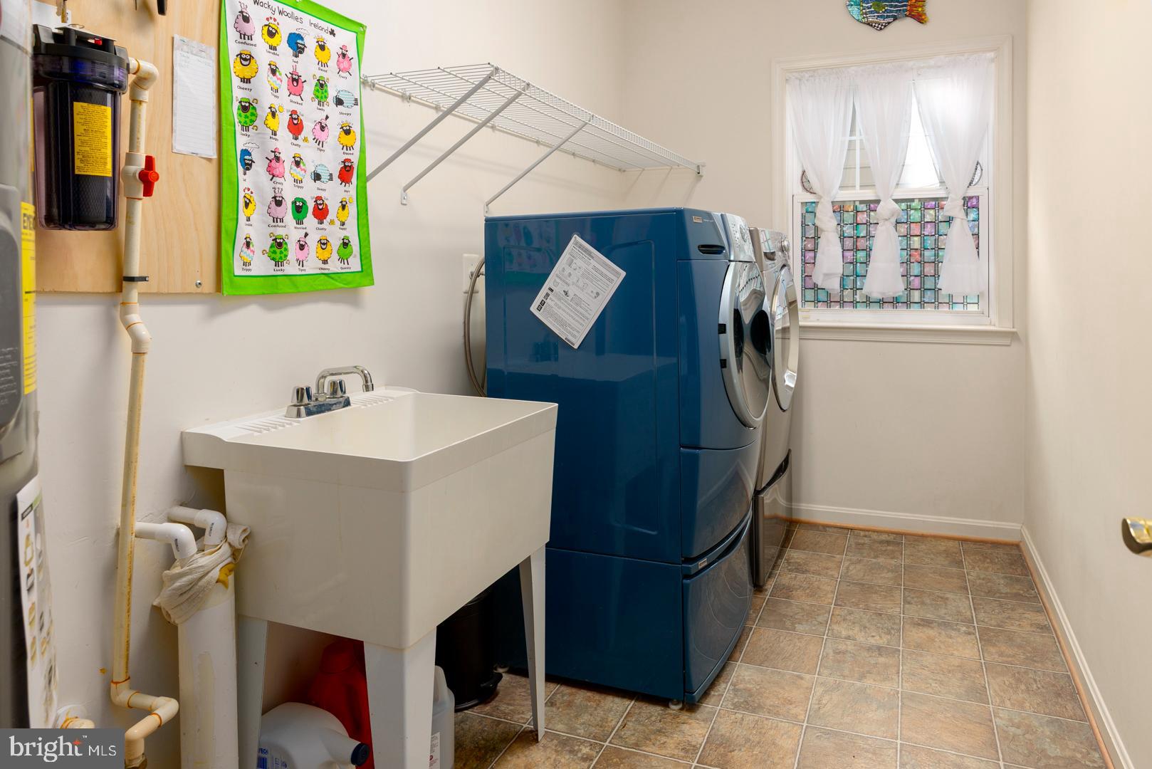 250 Concerto Avenue Centreville, MD 21617 - Photo 8 of 34 a bathroom with a sink and a mirror