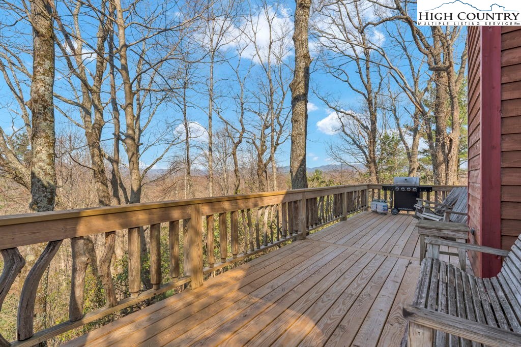 2095 Elk Ridge Road Ferguson, NC 28624 - Photo 12 of 34 a view of balcony with wooden floor and fence
