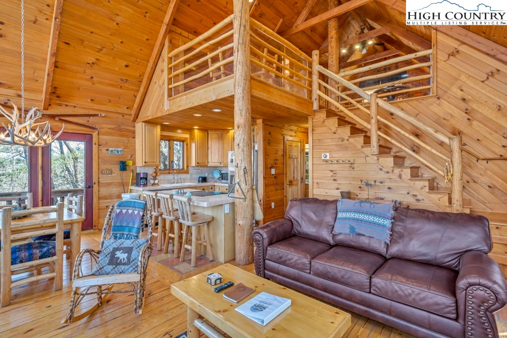2095 Elk Ridge Road Ferguson, NC 28624 - Photo 15 of 34 a view of a living room filled with furniture