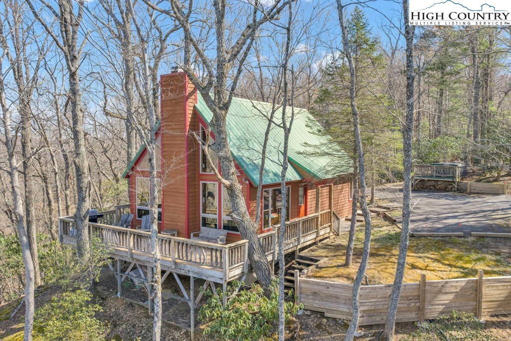 2095 Elk Ridge Road Ferguson, NC 28624 - Photo 2 of 34 a view of a house with a tree