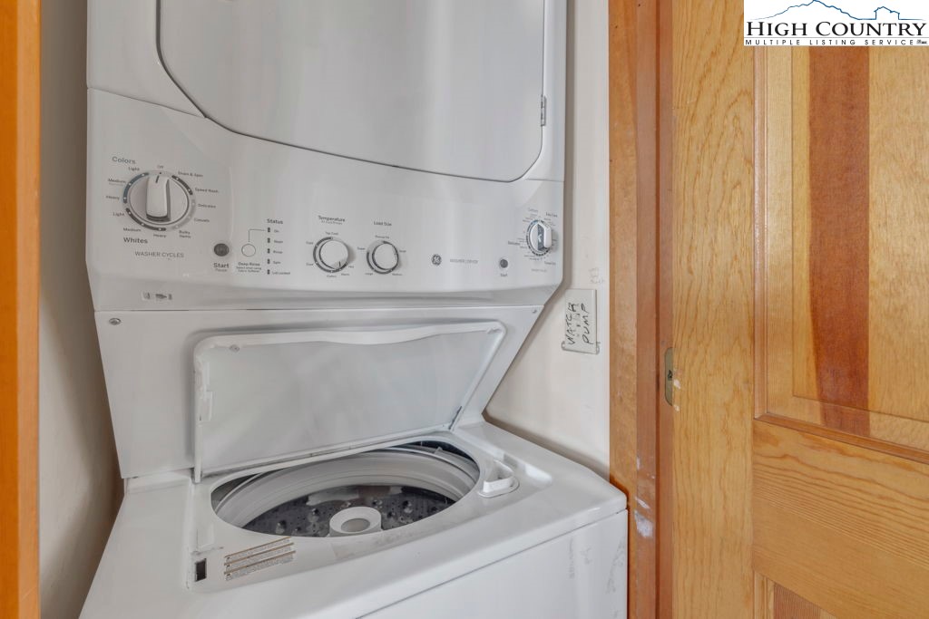 2095 Elk Ridge Road Ferguson, NC 28624 - Photo 25 of 34 a utility room with dryer and washer
