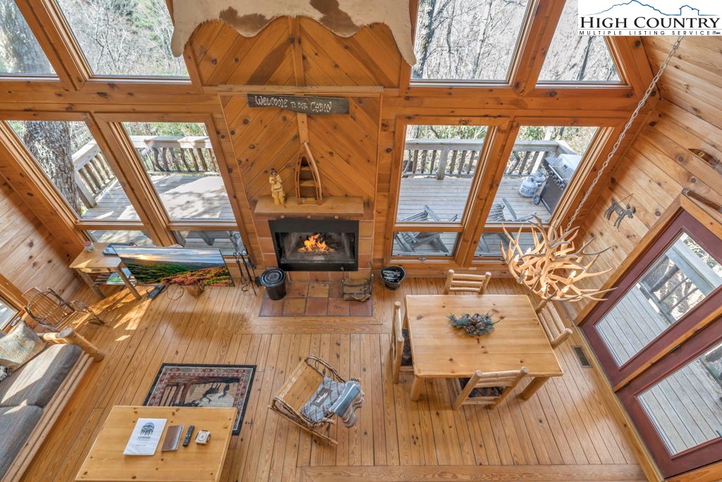 2095 Elk Ridge Road Ferguson, NC 28624 - Photo 29 of 34 a view of living room with furniture and a fireplace