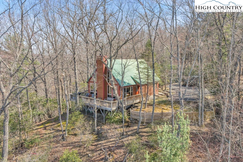 2095 Elk Ridge Road Ferguson, NC 28624 - Photo 6 of 34 a view of house with a backyard
