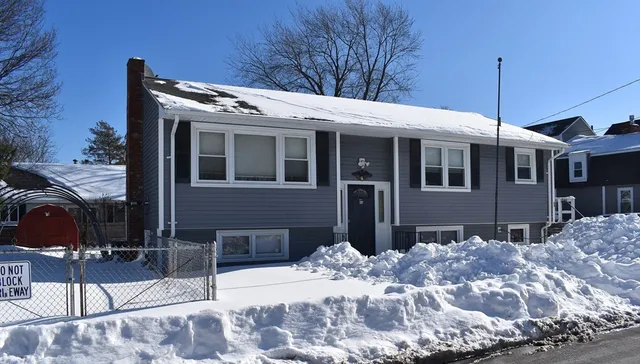 a view of a house with a snow