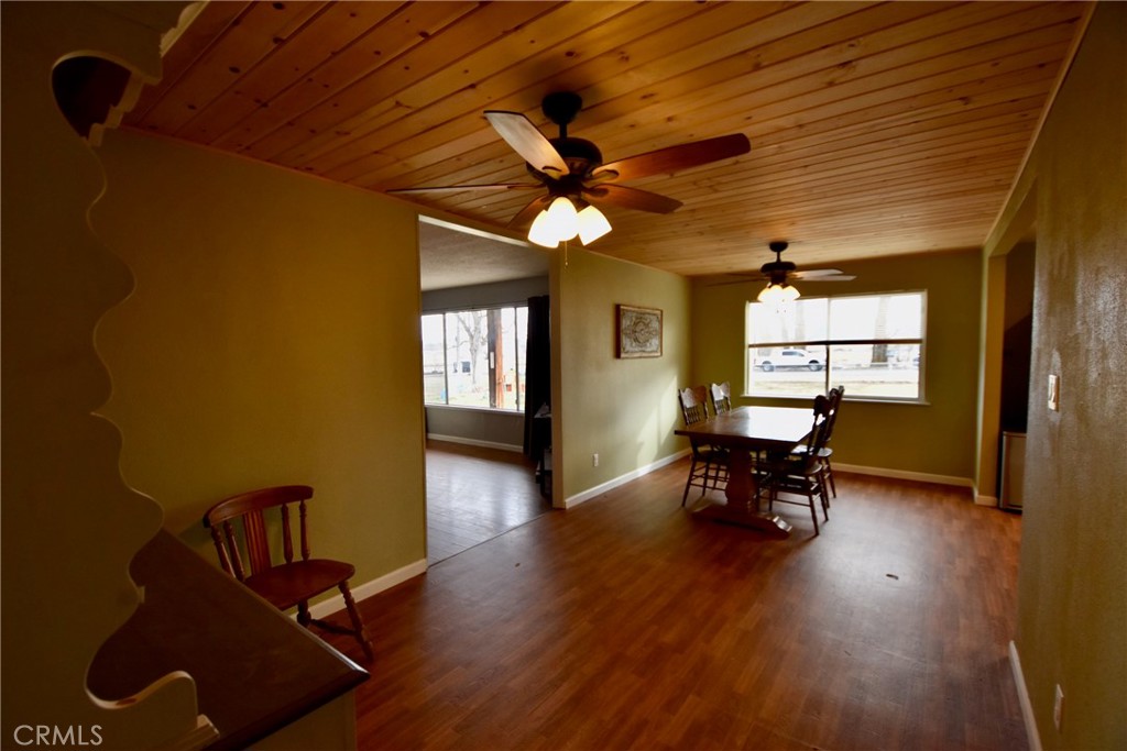 935 Truttman Lane Grenada, CA 96038 - Photo 12 of 44 a view of a dining room with furniture window and wooden floor