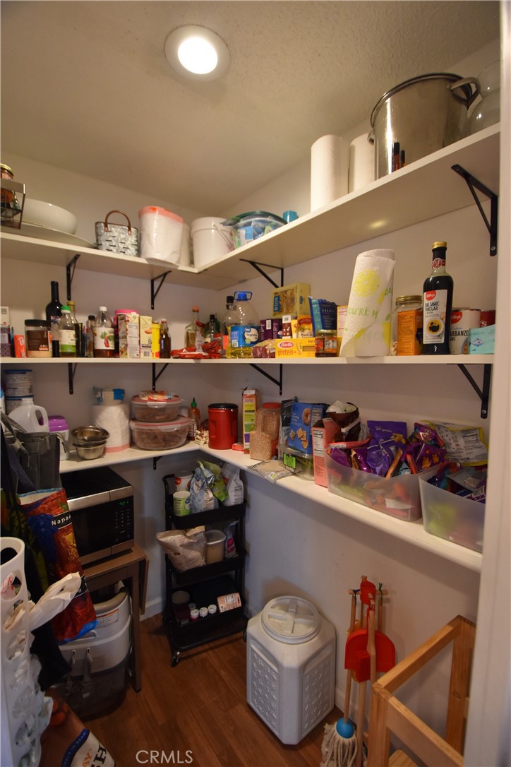 935 Truttman Lane Grenada, CA 96038 - Photo 13 of 44 a open kitchen with lots of clutter and stainless steel appliances