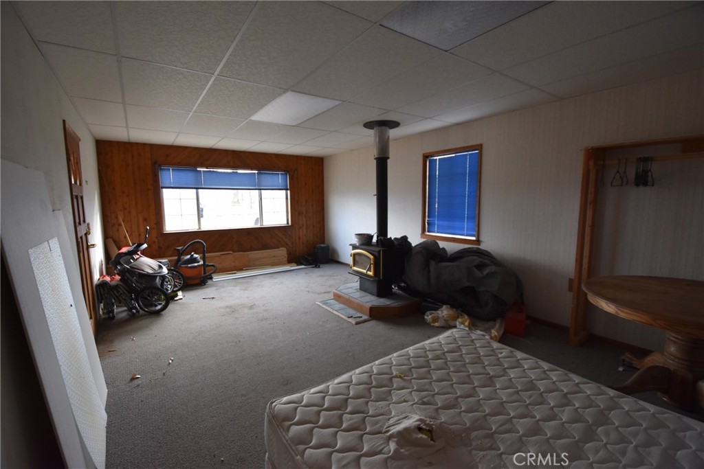 935 Truttman Lane Grenada, CA 96038 - Photo 17 of 44 a bed room with furniture and a window