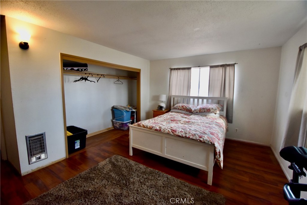 935 Truttman Lane Grenada, CA 96038 - Photo 19 of 44 a bedroom with a bed closet and a window