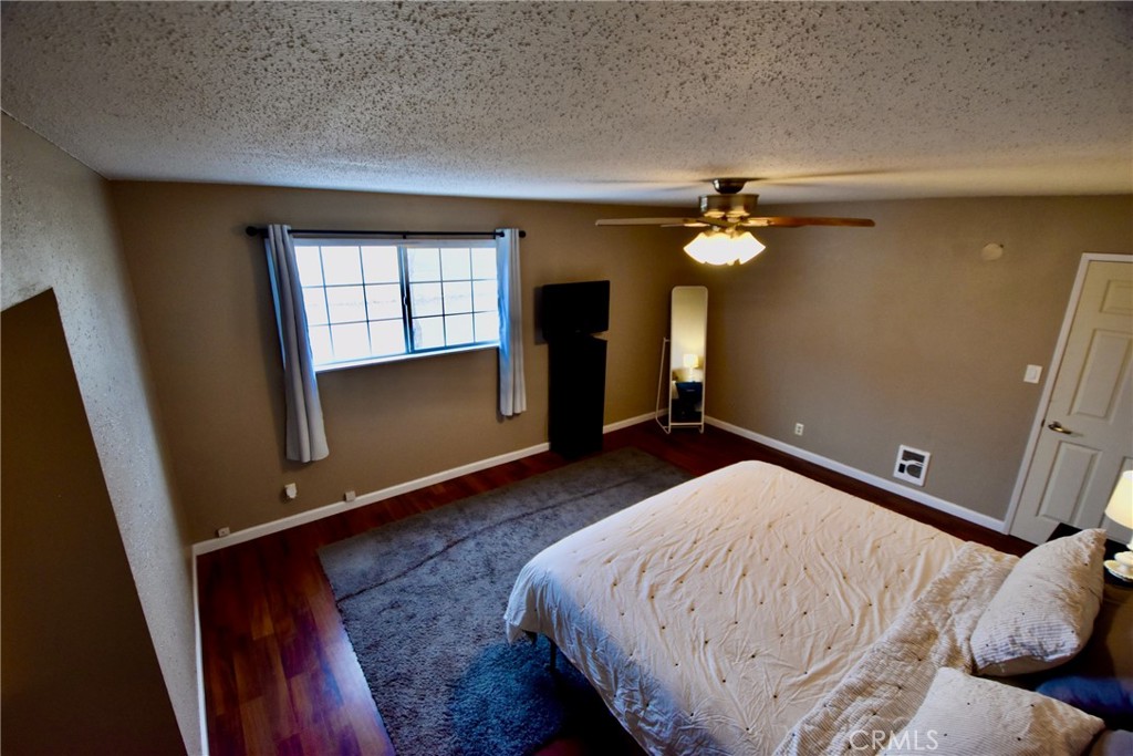 935 Truttman Lane Grenada, CA 96038 - Photo 25 of 44 a bedroom with a bed and a window