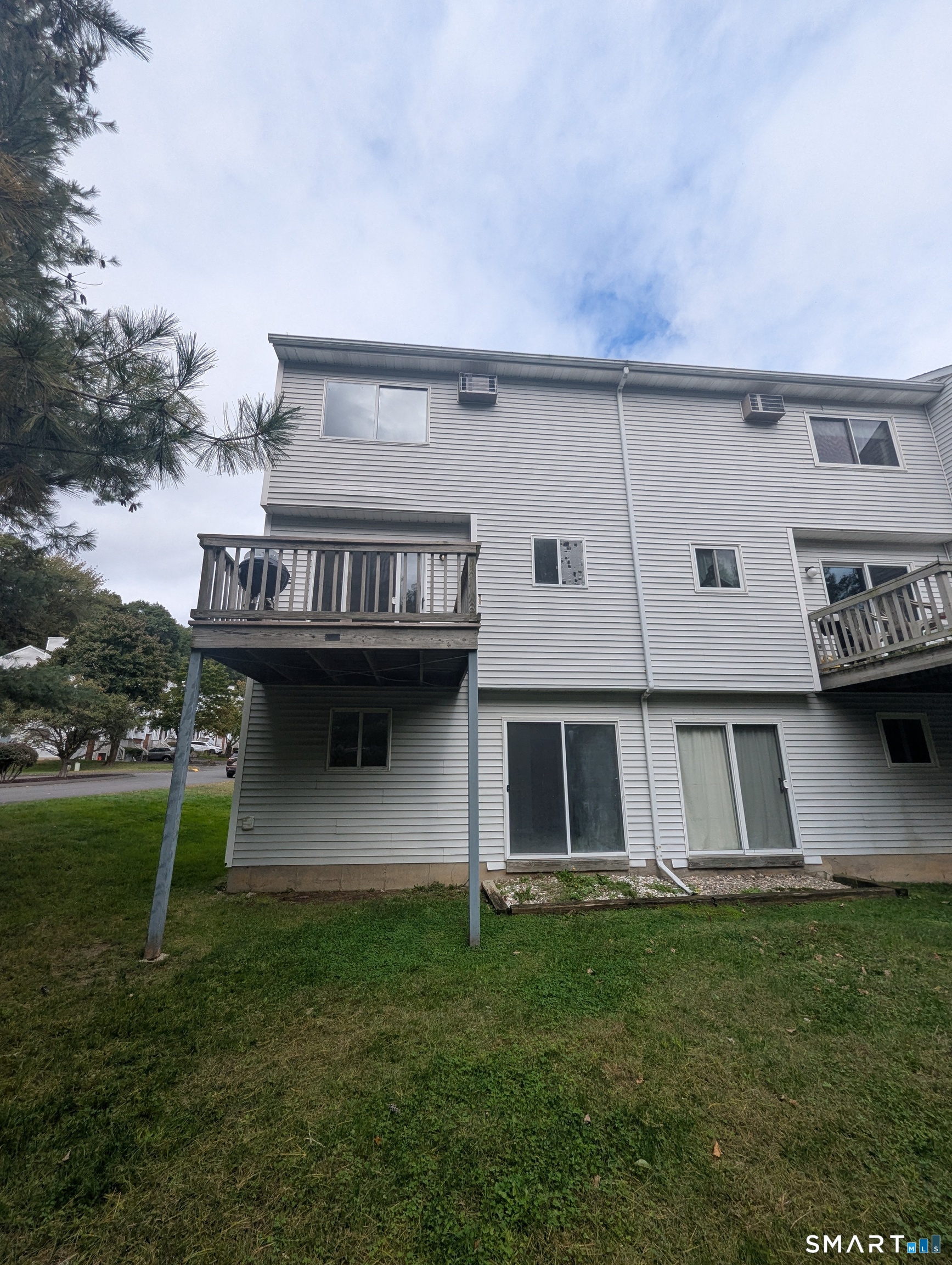 925 Oronoke Road, Unit 13J Waterbury, CT 06708 - Photo 19 of 19 Rear View of Condo End Unit