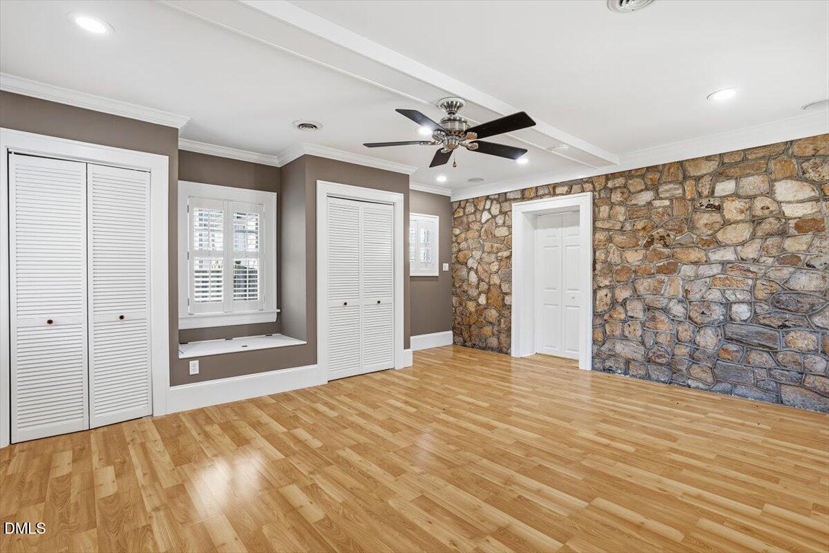 2609 Davis Street Raleigh, NC 27608 - Photo 26 of 31 The primary bedroom includes airflow comforts and recessed lighting.