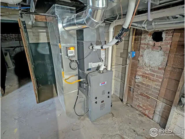 a view of a yard with snow on the road