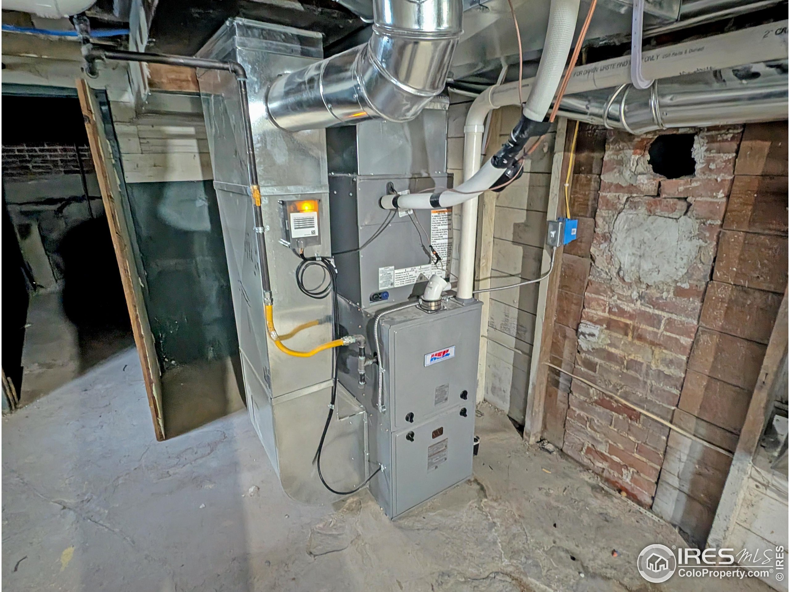 710 Carson Street Brush, CO 80723 - Photo 24 of 31 a view of storage and utility room