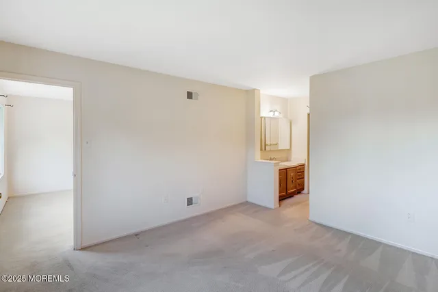 a bathroom with a sink a toilet and a bathtub