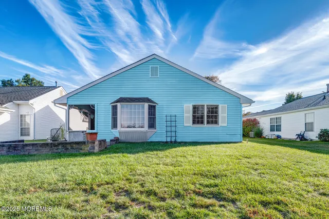 a house view with a garden space