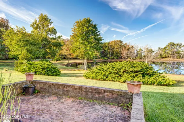 a view of a lake with a big yard