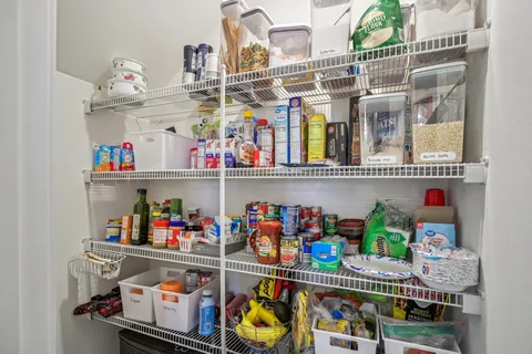 a store room with lots of clutter and lots of different kinds of food