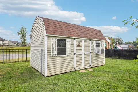 a view of swimming pool with outdoor seating