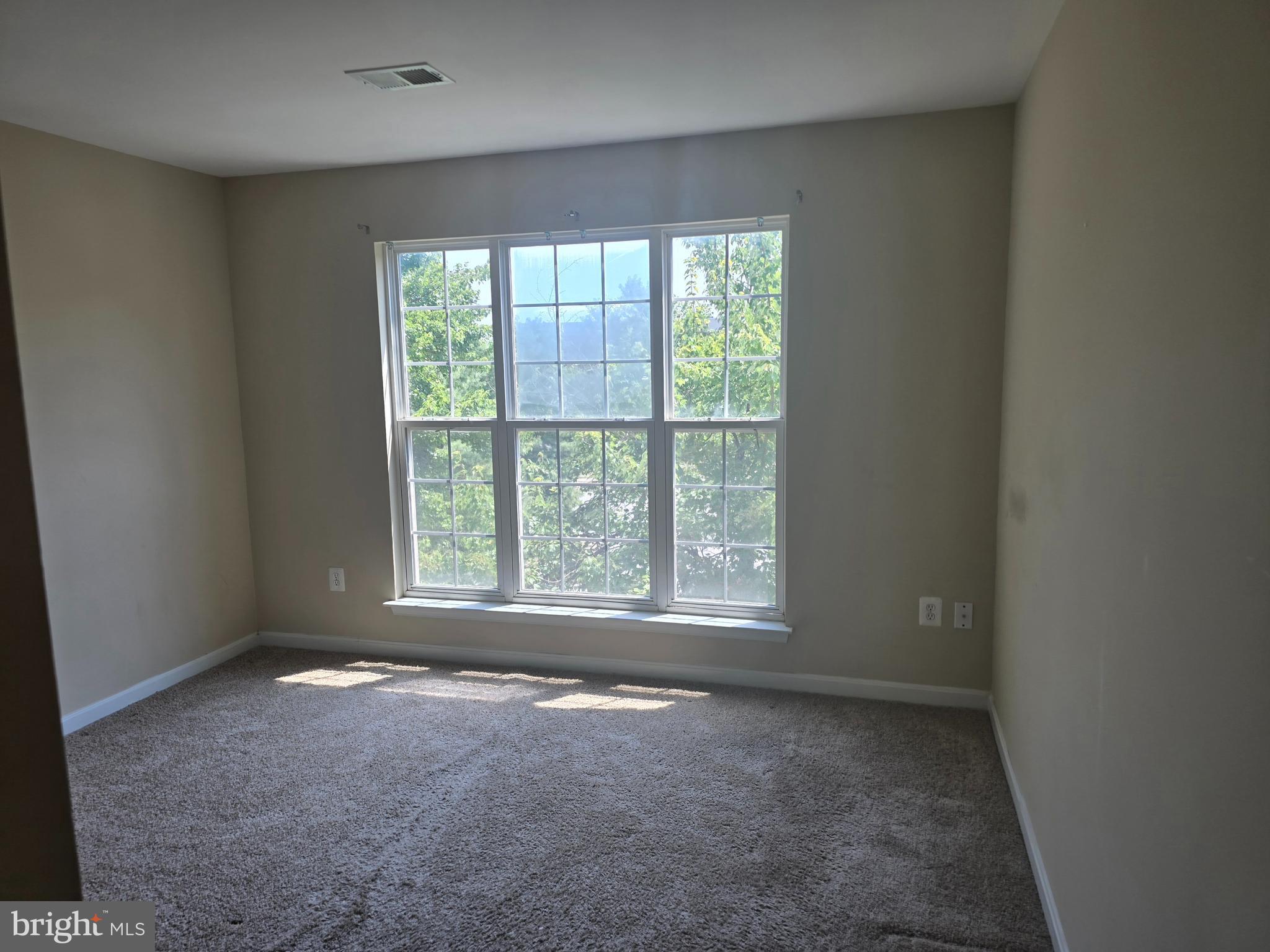 102 Royal Bonnet Place Frederick, MD 21702 - Photo 12 of 23 an empty room with a window