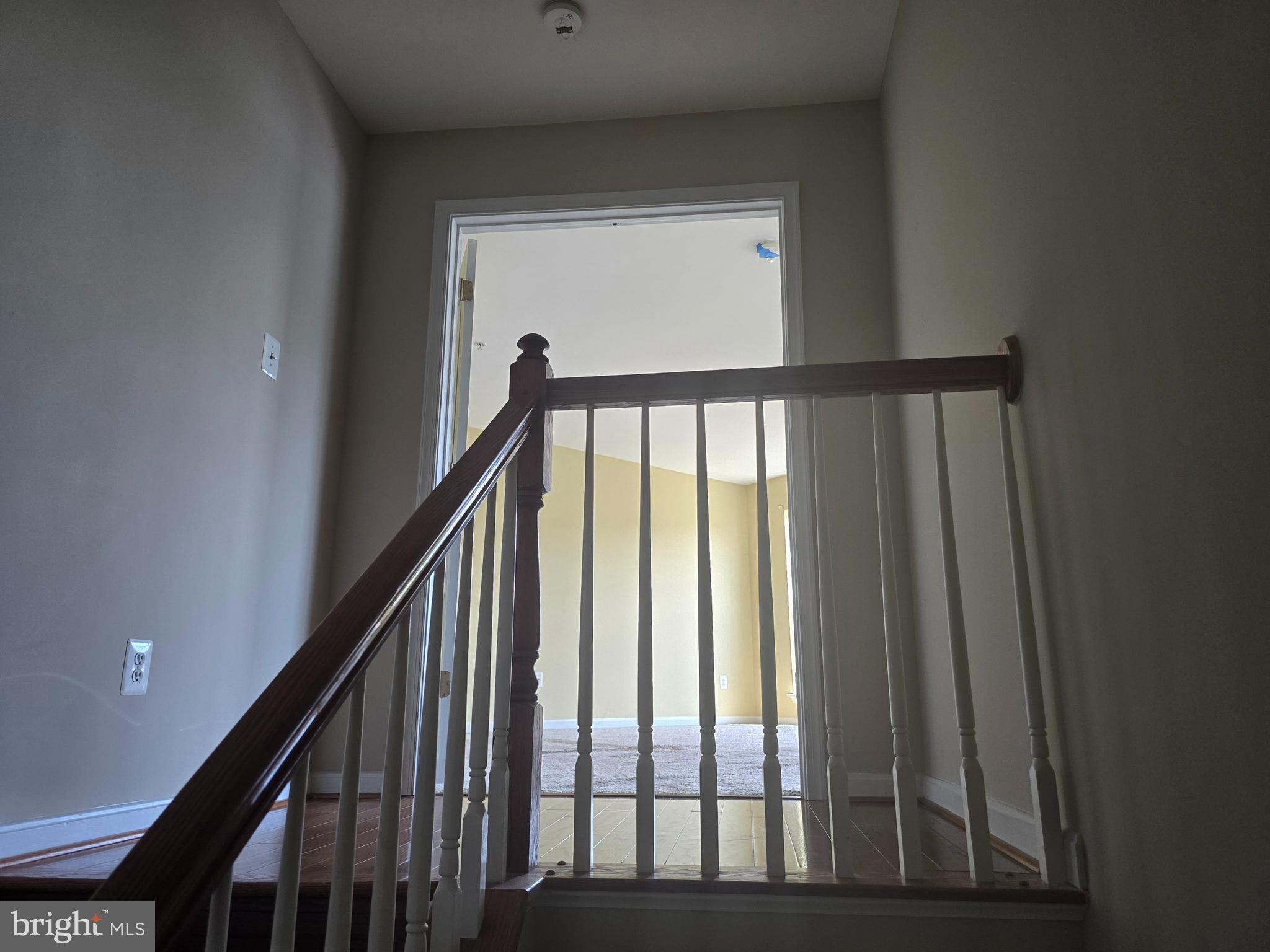 102 Royal Bonnet Place Frederick, MD 21702 - Photo 16 of 23 a view of staircase with railing and white walls