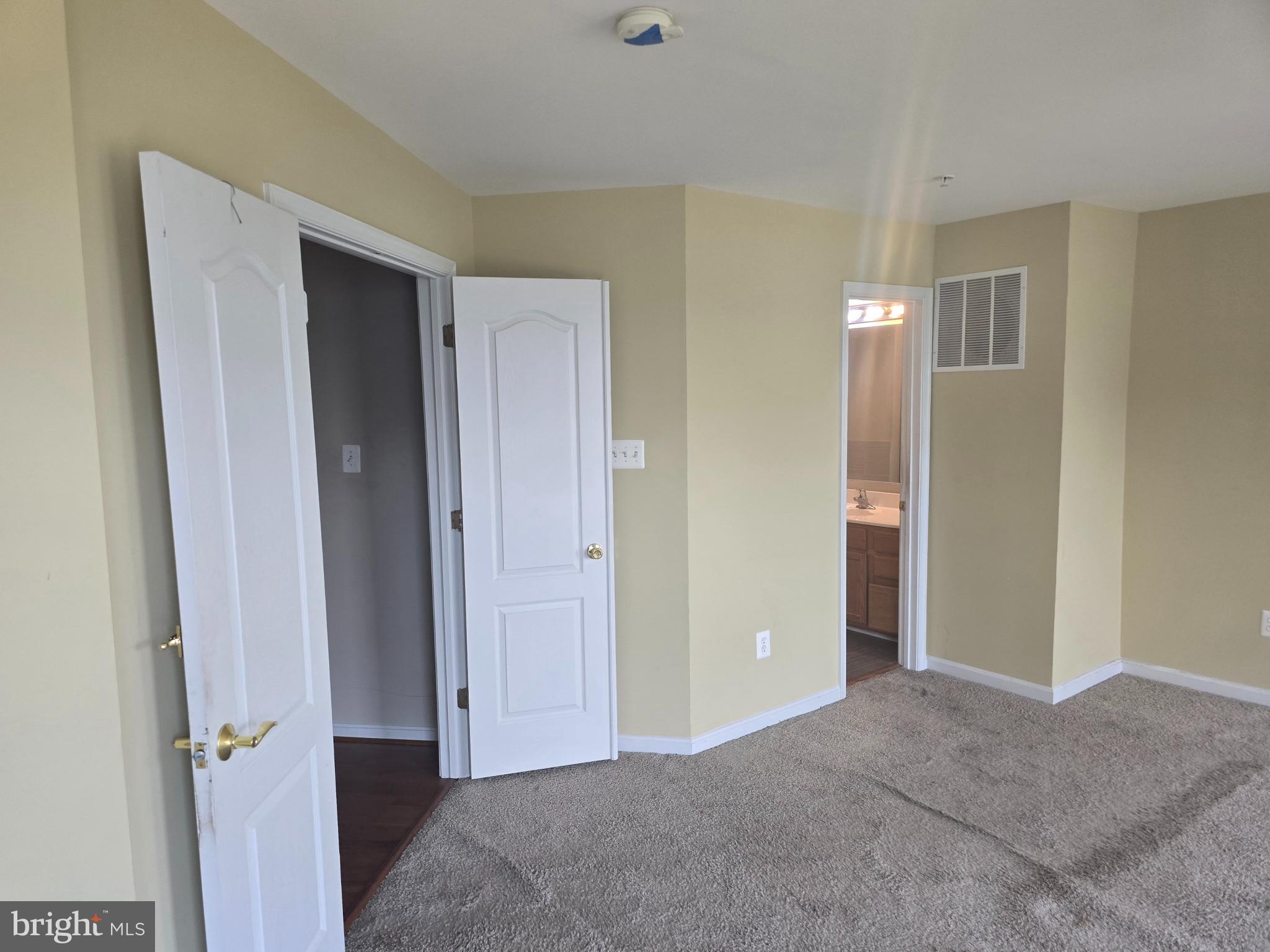 102 Royal Bonnet Place Frederick, MD 21702 - Photo 18 of 23 a view of a room with a hallway