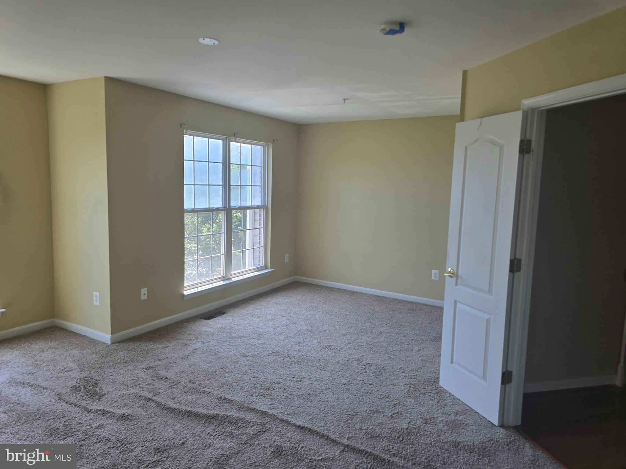 102 Royal Bonnet Place Frederick, MD 21702 - Photo 20 of 23 a view of an empty room with a window